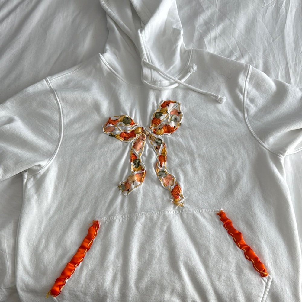 White Hoodie with Orange Fall Bow and Ribbon Accents